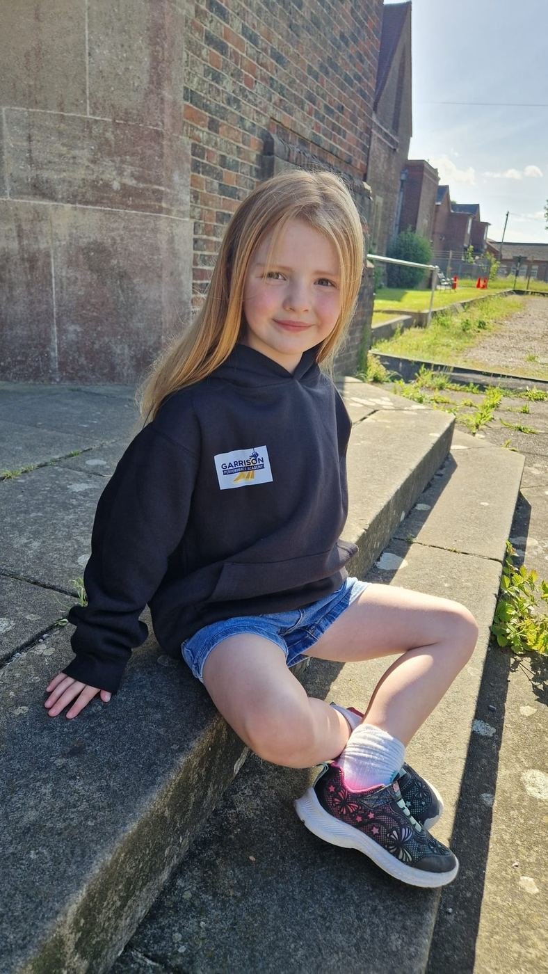 Student wearing an Academy hoodie