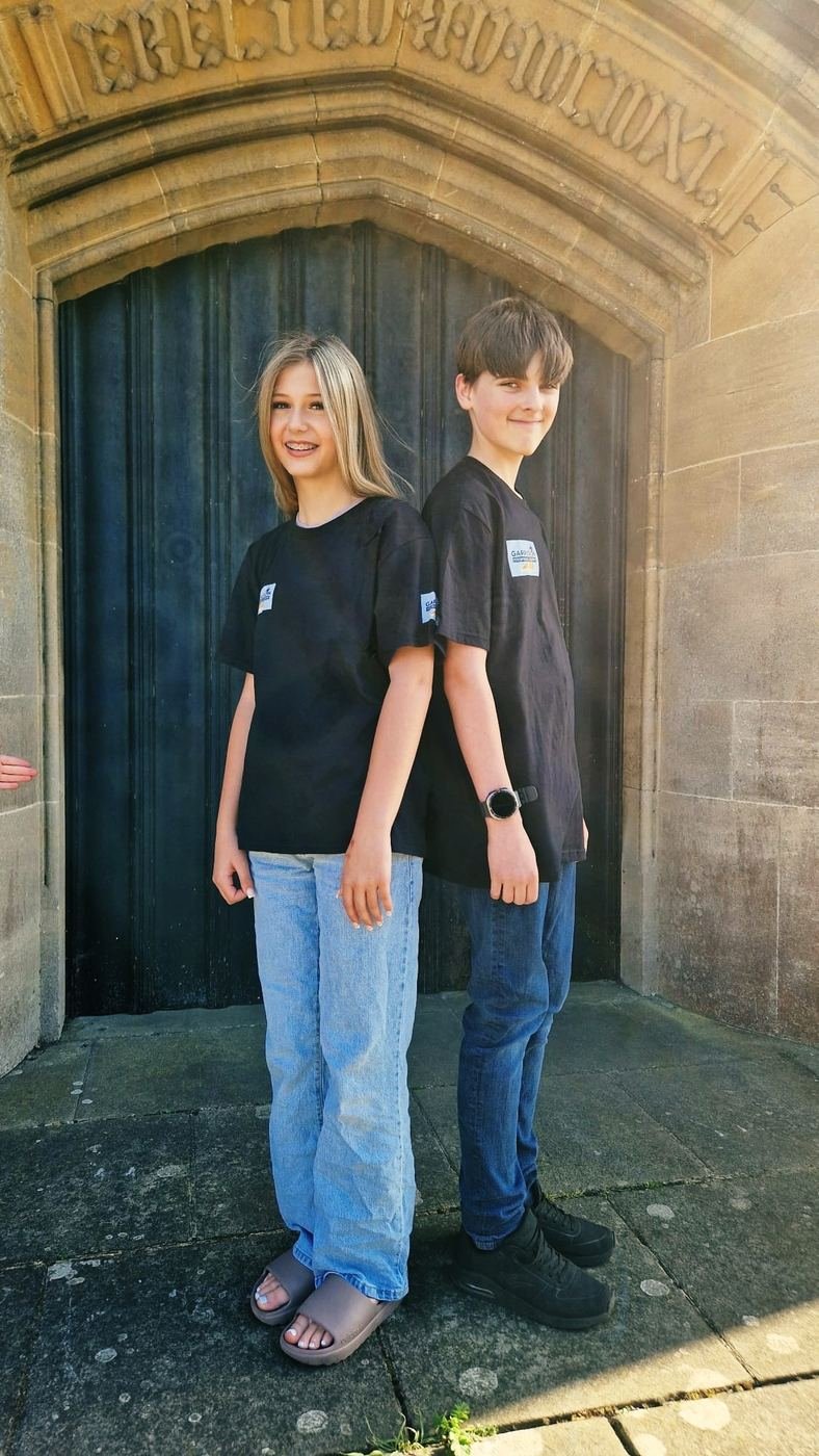 Two students outside the theatre